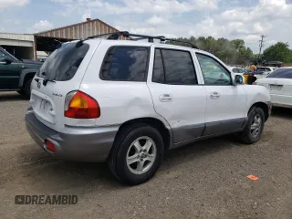 2004 Hyundai Santa Fe z VIN KM8SB12B04U640985, wystawiony jako Copart lot #56584595 z przebiegiem 239 527 mil mil oraz Szkoda całkowita • Salvage title. Historia ofert i sprzedaży dostępna na DreamBid. Obrazek 3.