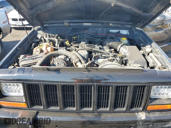 1998 Jeep Cherokee Sport with VIN 1J4FT68S8WL134461, listed as a Copart auction lot 74005704 with 0 mi miles and Salvage Title. Bid and sale history available at carsss.com. Image 11.
