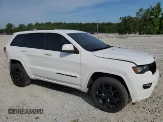 2018 Jeep Grand Cherokee Laredo E with VIN 1C4RJFAG3JC214922, listed as a Copart auction lot 56583955 with 133,643 mi miles and Clean Title. Bid and sale history available at DreamBid. Image 4.