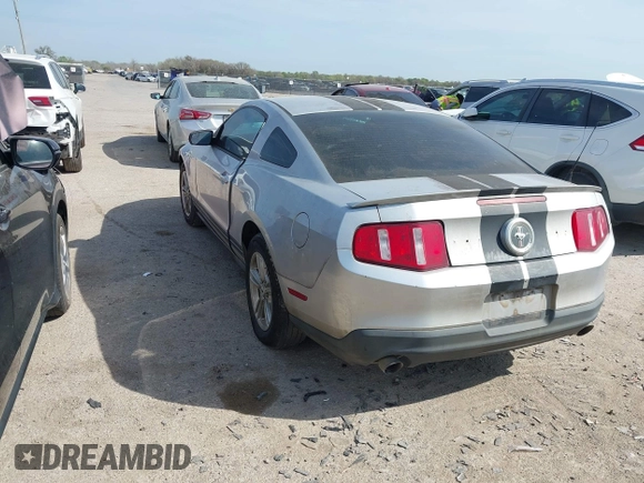 2012 Ford Mustang Premium with VIN 1ZVBP8AM5C5234532, listed as a IAAI auction lot 41860791 with 106,929 mi miles and . Bid and sale history available at DreamBid. Image 3.
