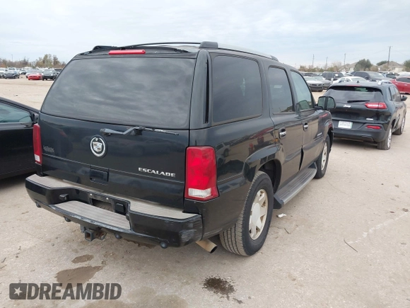 2003 Cadillac Escalade z VIN 1GYEC63T43R206146, wystawiony jako IAAI lot #41335727 z przebiegiem Nie podano mil oraz . Historia ofert i sprzedaży dostępna na DreamBid. Obrazek 4.