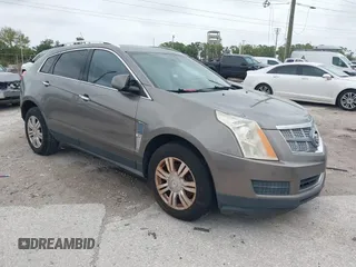 2012 Cadillac SRX Luxury Collection z VIN 3GYFNAE35CS509402, wystawiony jako IAAI lot #41765970 z przebiegiem 157 082 mil mil oraz . Historia ofert i sprzedaży dostępna na DreamBid. Obrazek 1.