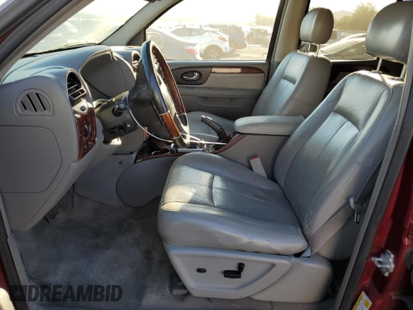 2006 GMC Envoy Denali z VIN 1GKES66M766163803, wystawiony jako Copart lot #75289784 z przebiegiem 194 386 mil mil oraz Szkoda całkowita • Salvage title. Historia ofert i sprzedaży dostępna na DreamBid. Obrazek 7.