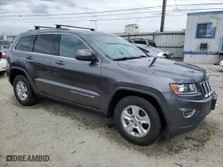 2014 Jeep Grand Cherokee Laredo with VIN 1C4RJEAG6EC225350, listed as a Copart auction lot 53573235 with 135,000 mi miles and Clean Title. Bid and sale history available at carsss.com. Image 4.