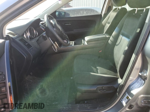 2015 Mazda CX-9 Sport с VIN JM3TB2BV2F0454150, выставлен на аукционе Copart как лот 68082694 с пробегом 166 758 миль миль и Чистый • Clean title. История ставок и продаж доступна на DreamBid. Изображение 7.