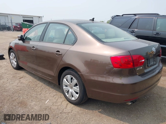 2014 Volkswagen Jetta SE with VIN 3VWD07AJ7EM251973, listed as a IAAI auction lot 42415573 with 124,323 mi miles and . Bid and sale history available at DreamBid. Image 3.