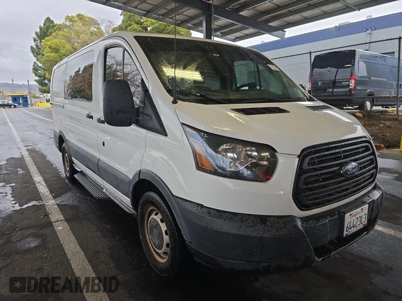 2016 Ford Transit Cargo z VIN 1FTYE1YM9GKB18600, wystawiony jako IAAI lot #42726792 z przebiegiem 127 434 mil mil oraz . Historia ofert i sprzedaży dostępna na DreamBid. Obrazek 21.