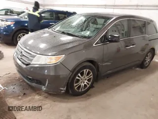 2011 Honda Odyssey EX-L with VIN 5FNRL5H67BB049446, listed as a IAAI auction lot 42116436 with 197,667 mi miles and . Bid and sale history available at carsss.com. Image 2.