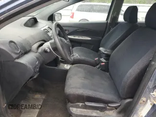 2007 Toyota Yaris with VIN JTDBT923071139724, listed as a Copart auction lot 51809545 with 220,598 mi miles and Salvage Title. Bid and sale history available at DreamBid. Image 7.