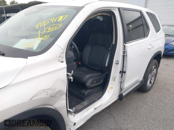 2023 Honda Pilot EX-L with VIN 5FNYG1H58PB016138, listed as a IAAI auction lot 40591717 with 10,068 mi miles and . Bid and sale history available at DreamBid. Image 6.