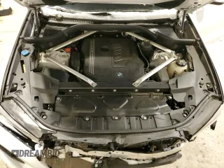 2020 BMW X6 xDrive40i z VIN 5UXCY6C07L9B43453, wystawiony jako Copart lot #52096845 z przebiegiem Nie podano mil oraz Szkoda całkowita • Salvage title. Historia ofert i sprzedaży dostępna na DreamBid. Obrazek 12.