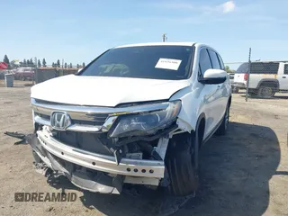2020 Honda Pilot EX-L with VIN 5FNYF5H59LB027265, listed as a IAAI auction lot 41826300 with 57,201 mi miles. Bid and sale history available at carsss.com. Image 2.