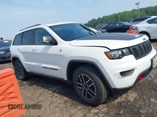 2021 Jeep Grand Cherokee Trailhawk with VIN 1C4RJFLG5MC564912, listed as a IAAI auction lot 42589787 with 25,604 mi miles and . Bid and sale history available at DreamBid. Image 13.