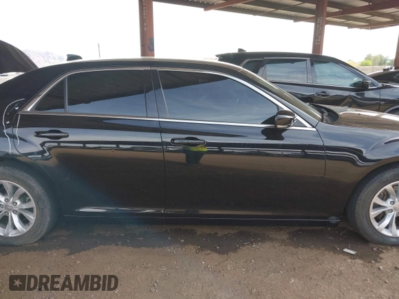 2016 Chrysler 300 Anniversary Edition with VIN 2C3CCAAG4GH141217, listed as a IAAI auction lot 42121809 with 74,739 mi miles and . Bid and sale history available at DreamBid. Image 14.