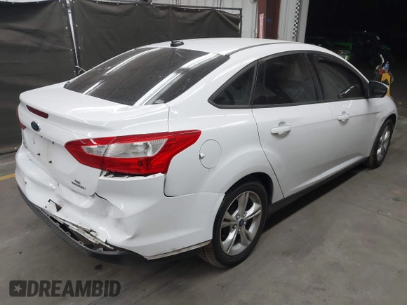 2014 Ford Focus SE with VIN 1FADP3F22EL437727, listed as a IAAI auction lot 42001593 with 90,814 mi miles. Bid and sale history available at carsss.com. Image 4.