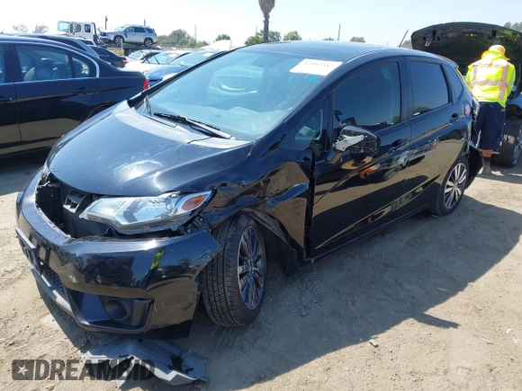 2015 Honda Fit EX-L z VIN 3HGGK5H85FM717646, wystawiony jako IAAI lot #42483387 z przebiegiem 137 296 mil mil oraz . Historia ofert i sprzedaży dostępna na DreamBid. Obrazek 20.