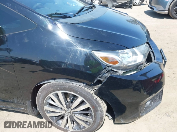 2015 Honda Fit EX-L z VIN 3HGGK5H85FM717646, wystawiony jako IAAI lot #42483387 z przebiegiem 137 296 mil mil oraz . Historia ofert i sprzedaży dostępna na DreamBid. Obrazek 17.
