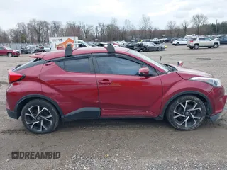 2018 Toyota C-HR XLE z VIN NMTKHMBX7JR005504, wystawiony jako IAAI lot #41806239 z przebiegiem 114 475 mil mil oraz . Historia ofert i sprzedaży dostępna na DreamBid. Obrazek 13.