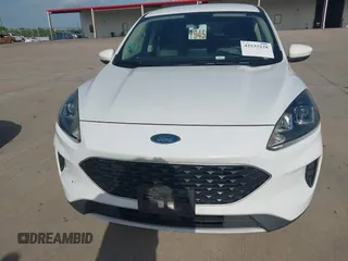 2020 Ford Escape SE z VIN 1FMCU0G67LUA10190, wystawiony jako IAAI lot #42533228 z przebiegiem 135 961 mil mil oraz . Historia ofert i sprzedaży dostępna na DreamBid. Obrazek 12.