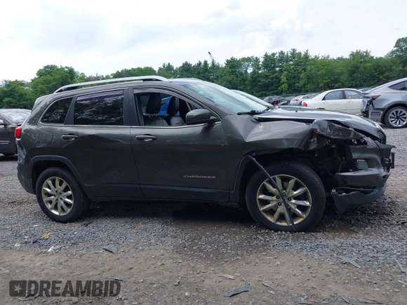 2014 Jeep Cherokee Limited with VIN 1C4PJMDB2EW216225, listed as a IAAI auction lot 42672551 with 151,799 mi miles and . Bid and sale history available at DreamBid. Image 13.