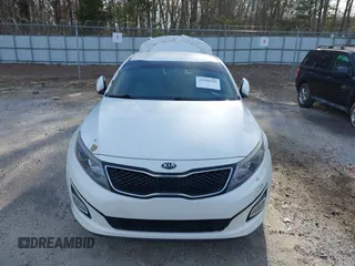 2015 Kia Optima EX with VIN 5XXGN4A77FG437245, listed as a IAAI auction lot 41560539 with 196,480 mi miles and . Bid and sale history available at DreamBid. Image 13.