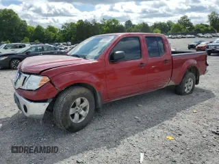 2009 Nissan Frontier SE with VIN 1N6AD09W49C404296, listed as a Copart auction lot 61040855 with 144,321 mi miles and Salvage title. Bid and sale history available at DreamBid. Image 1.