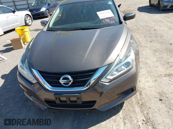 2016 Nissan Altima S with VIN 1N4AL3AP9GN389846, listed as a IAAI auction lot 42027199 with 93,370 mi miles and . Bid and sale history available at carsss.com. Image 12.