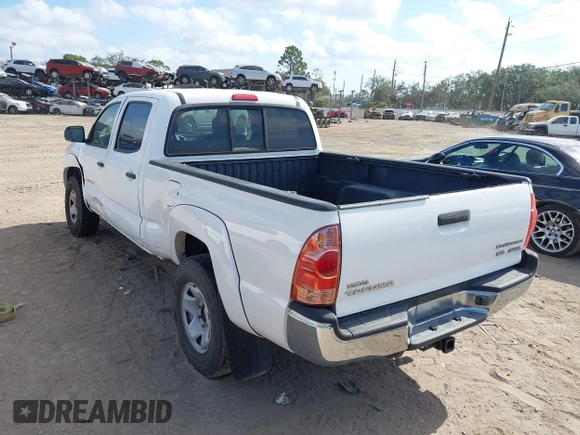 2005 Toyota Tacoma PreRunner with VIN 3TMKU72N65M001821, listed as a IAAI auction lot 41579911 with 301,297 mi miles. Bid and sale history available at carsss.com. Image 3.