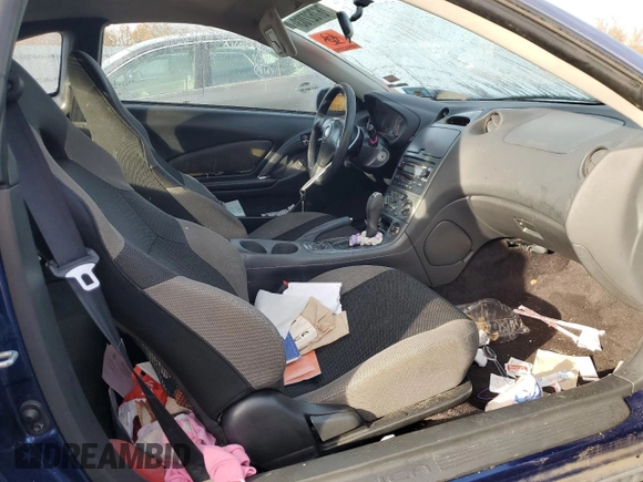 2004 Toyota Celica GT with VIN JTDDR32T340171301, listed as a Copart auction lot 74225804 with 145,996 mi miles and Salvage Title. Bid and sale history available at DreamBid. Image 7.