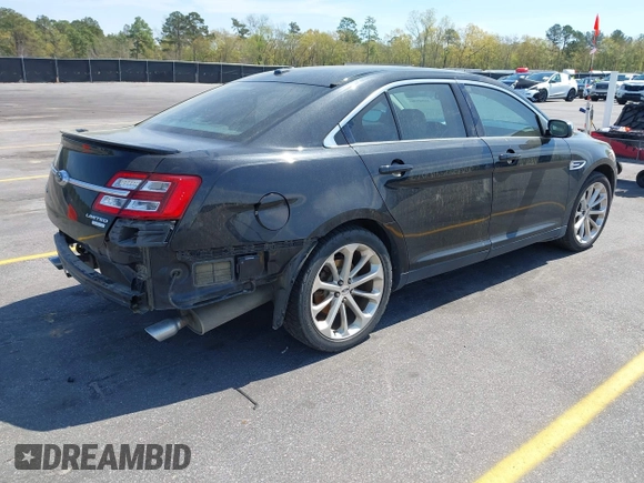 2015 Ford Taurus Limited with VIN 1FAHP2J81FG134973, listed as a IAAI auction lot 41845384 with 139,203 mi miles. Bid and sale history available at carsss.com. Image 4.