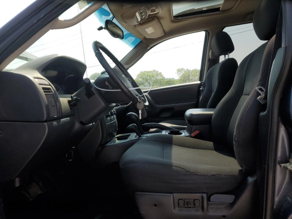 2002 Jeep Grand Cherokee Laredo with VIN 1J4GW48S92C319161, listed as a Copart auction lot 59304035 with 257,907 mi miles and Salvage title. Bid and sale history available at DreamBid. Image 7.