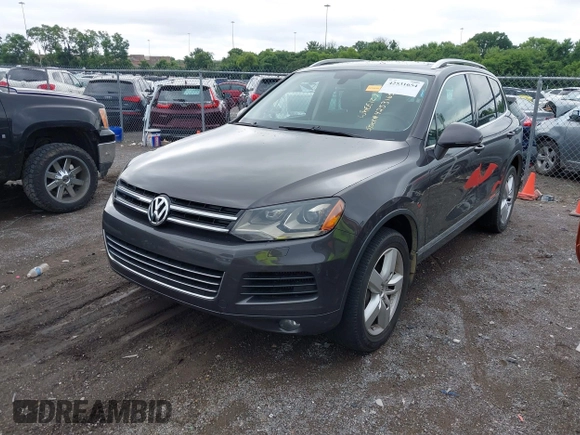 2012 Volkswagen Touareg Sport with VIN WVGFK9BP0CD002939, listed as a IAAI auction lot 42531654 with 222,435 mi miles and . Bid and sale history available at DreamBid. Image 17.