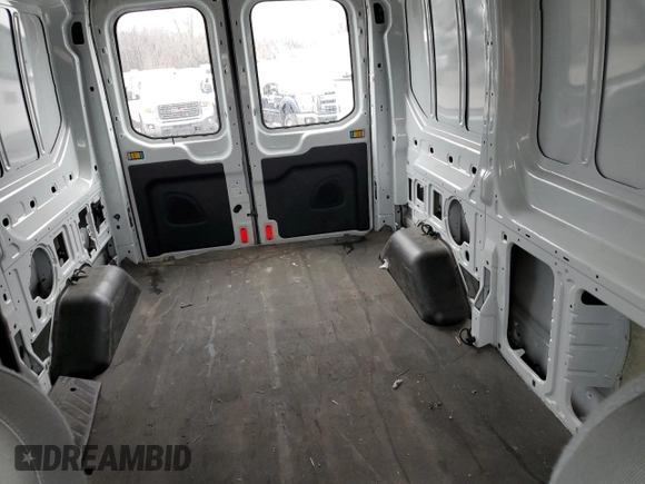 2015 Ford Transit Cargo with VIN 1FTYE1CM7FKA24477, listed as a Copart auction lot 86310214 with 54,098 mi miles and Salvage title. Bid and sale history available at DreamBid. Image 11.