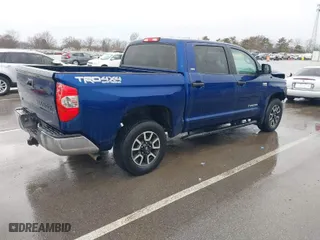 2014 Toyota Tundra 4WD Truck SR5 with VIN 5TFDY5F19EX412813, listed as a IAAI auction lot 41652585 with 164,091 mi miles. Bid and sale history available at carsss.com. Image 4.