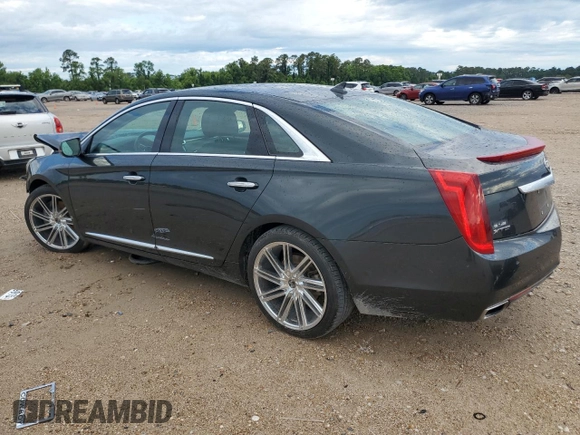 2013 Cadillac XTS Luxury z VIN 2G61P5S33D9217027, wystawiony jako Copart lot #56358835 z przebiegiem 82 644 mil mil oraz Szkoda całkowita • Salvage title. Historia ofert i sprzedaży dostępna na DreamBid. Obrazek 2.