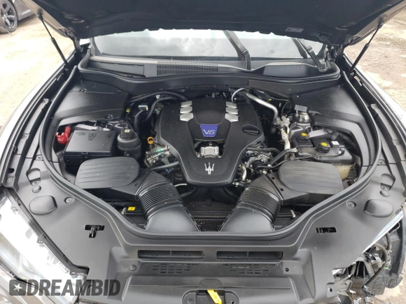 2017 Maserati Levante S z VIN ZN661YUS3HX196812, wystawiony jako Copart lot #69257744 z przebiegiem Nie podano mil oraz Szkoda całkowita • Salvage title. Historia ofert i sprzedaży dostępna na DreamBid. Obrazek 12.