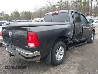 2015 Ram 1500 SLT z VIN 1C6RR6GG9FS512153, wystawiony jako IAAI lot #41475083 z przebiegiem 64 338 mil mil oraz . Historia ofert i sprzedaży dostępna na DreamBid. Obrazek 4.