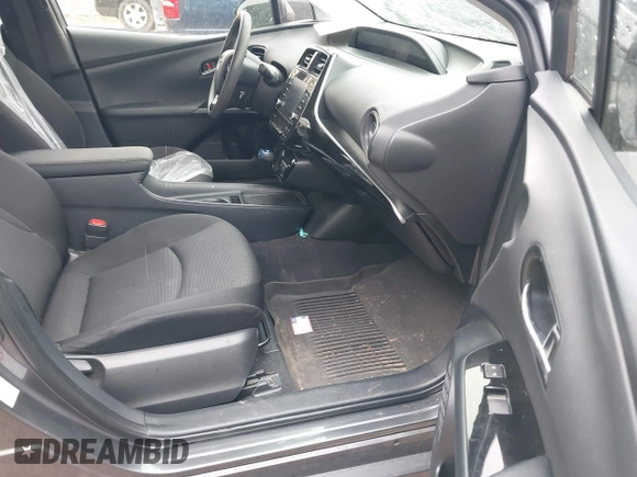 2021 Toyota Prius L Eco with VIN JTDKAMFU6M3140081, listed as a IAAI auction lot 42131187 with 103,973 mi miles and . Bid and sale history available at DreamBid. Image 5.
