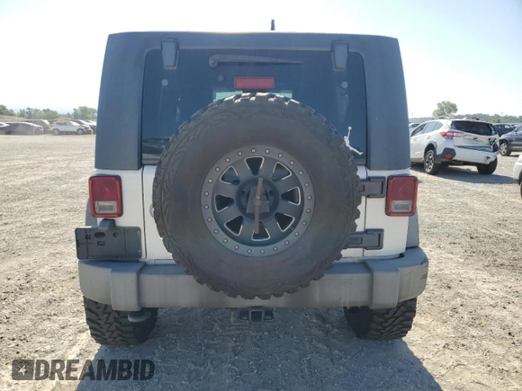 2009 Jeep Wrangler Unlimited Rubicon with VIN 1J8GA69149L767218, listed as a Copart auction lot 59342825 with 157,307 mi miles and Salvage title. Bid and sale history available at DreamBid. Image 6.