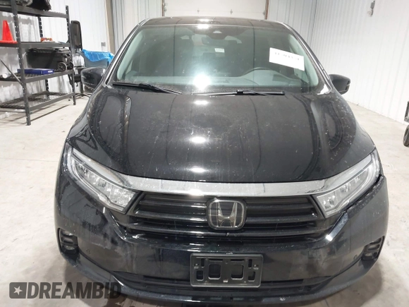 2023 Honda Odyssey Touring z VIN 5FNRL6H85PB039450, wystawiony jako IAAI lot #41504351 z przebiegiem 51 000 mil mil oraz . Historia ofert i sprzedaży dostępna na DreamBid. Obrazek 12.