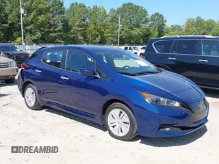 2023 Nissan LEAF S z VIN 1N4AZ1BV6PC556918, wystawiony jako IAAI lot #40190223 z przebiegiem 29 385 mil mil oraz . Historia ofert i sprzedaży dostępna na DreamBid. Obrazek 1.