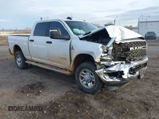 2023 Ram 2500 Big Horn with VIN 3C6UR5DL2PG618989, listed as a IAAI auction lot 40917764 with 35,736 mi miles. Bid and sale history available at carsss.com. Image 1.