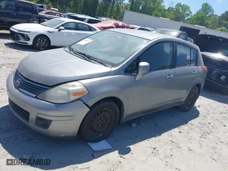 2008 Nissan Versa 1.8 S with VIN 3N1BC13E08L406990, listed as a IAAI auction lot 42080031 with 175,008 mi miles. Bid and sale history available at carsss.com. Image 2.