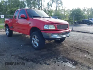 1997 Ford F-150 z VIN 1FTEX08L3VKC13181, wystawiony jako IAAI lot #42485746 z przebiegiem 167 935 mil mil oraz . Historia ofert i sprzedaży dostępna na DreamBid. Obrazek 1.