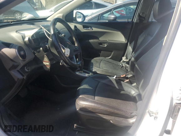 2014 Chevrolet Sonic LTZ with VIN 1G1JE5SB7E4202652, listed as a Copart auction lot 48540805 with 128,328 mi miles and Salvage Title. Bid and sale history available at carsss.com. Image 7.