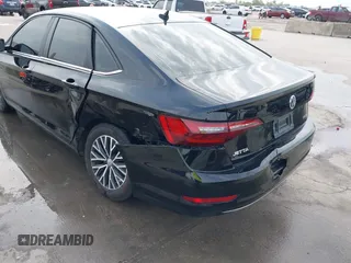 2021 Volkswagen Jetta S with VIN 3VWC57BU1MM006316, listed as a IAAI auction lot 42139509 with 97,192 mi miles and . Bid and sale history available at DreamBid. Image 6.