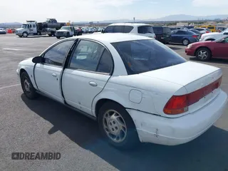1997 Saturn SL with VIN 1G8ZK5275VZ254745, listed as a IAAI auction lot 41686816 with 135,074 mi miles and . Bid and sale history available at DreamBid. Image 6.