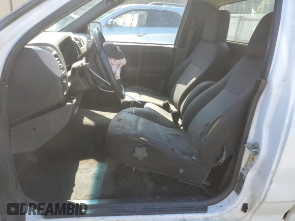 2012 GMC Canyon Work Truck with VIN 1GTC5LF96C8115889, listed as a Copart auction lot 48882985 with 410,845 mi miles and Salvage Title. Bid and sale history available at carsss.com. Image 7.