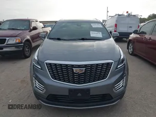 2021 Cadillac XT5 FWD Premium Luxury with VIN 1GYKNCRS5MZ128908, listed as a IAAI auction lot 41919571 with 51,280 mi miles and . Bid and sale history available at carsss.com. Image 13.