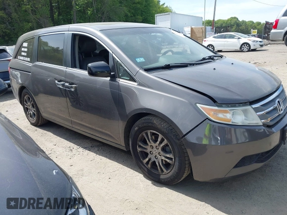 2012 Honda Odyssey EX-L with VIN 5FNRL5H63CB037697, listed as a IAAI auction lot 42262596 with 135,218 mi miles and . Bid and sale history available at DreamBid. Image 13.